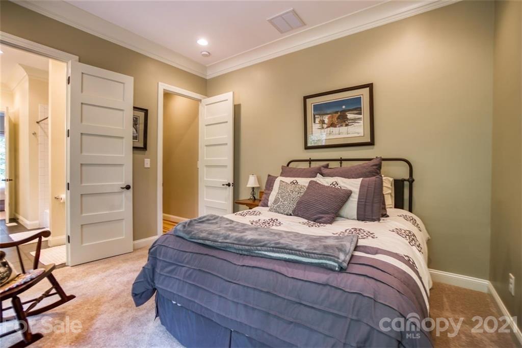 9658 Van Wyck Road Lancaster, SC 29720 - Photo 30 of 44 a bedroom with bed and glass door