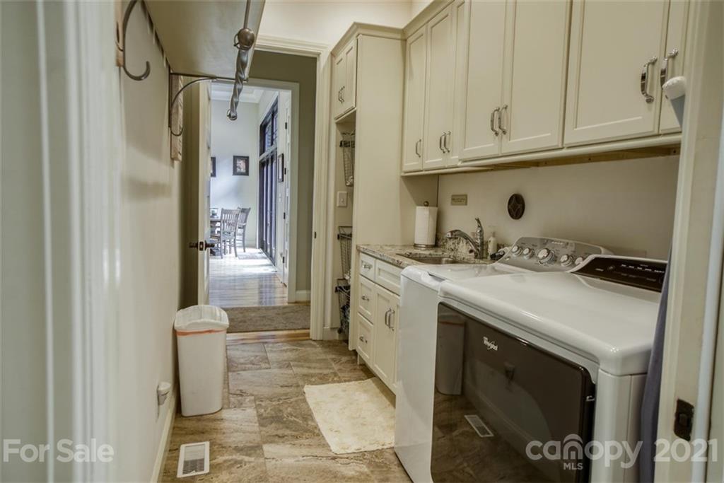 9658 Van Wyck Road Lancaster, SC 29720 - Photo 31 of 44 a bathroom with a sink a toilet and shower