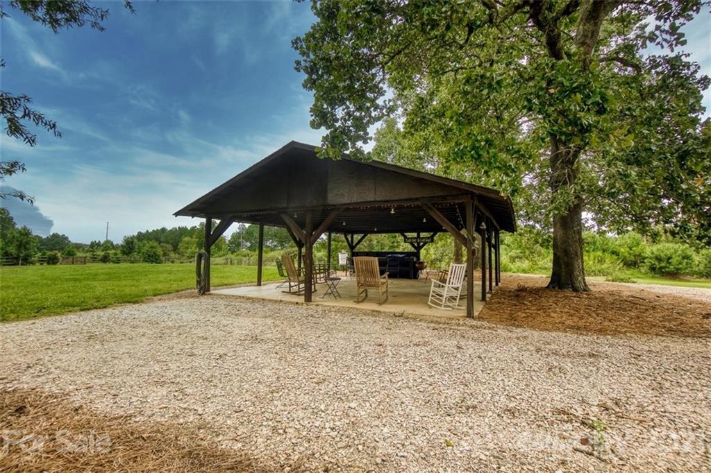 9658 Van Wyck Road Lancaster, SC 29720 - Photo 42 of 44 a backyard of a house with barbeque oven
