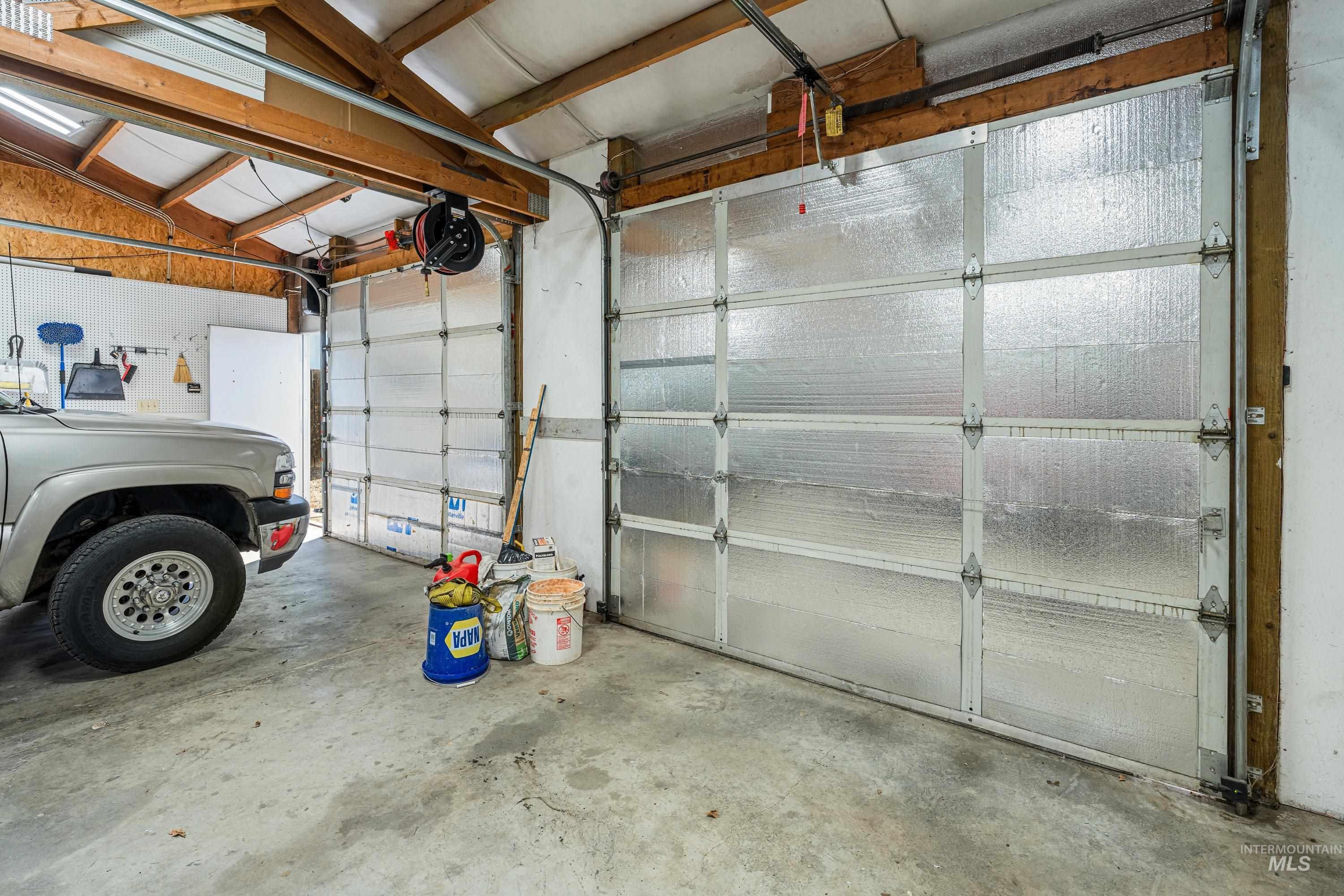 1266 Maple Street Clarkston, WA 99403 - Photo 34 of 44 Concrete flooring with two overhead garage doors