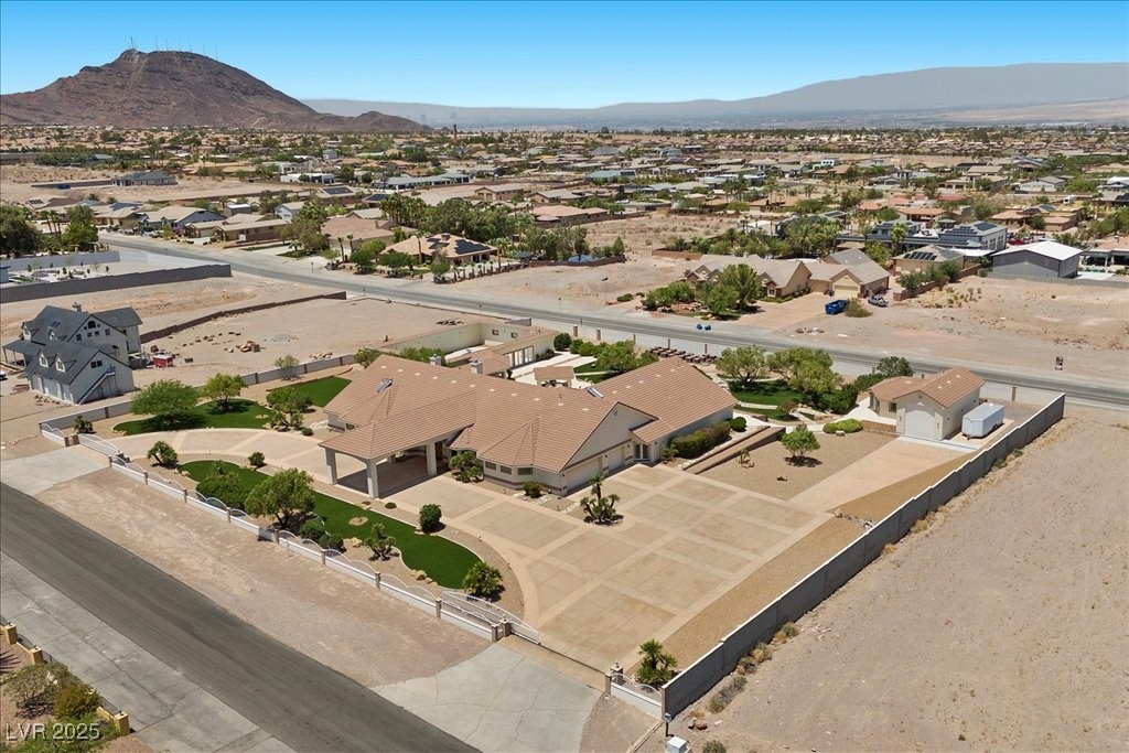 640 Quail Covey Road Henderson, NV 89002 - Photo 58 of 75 Aerial perspective of suburban area with a mountain backdrop