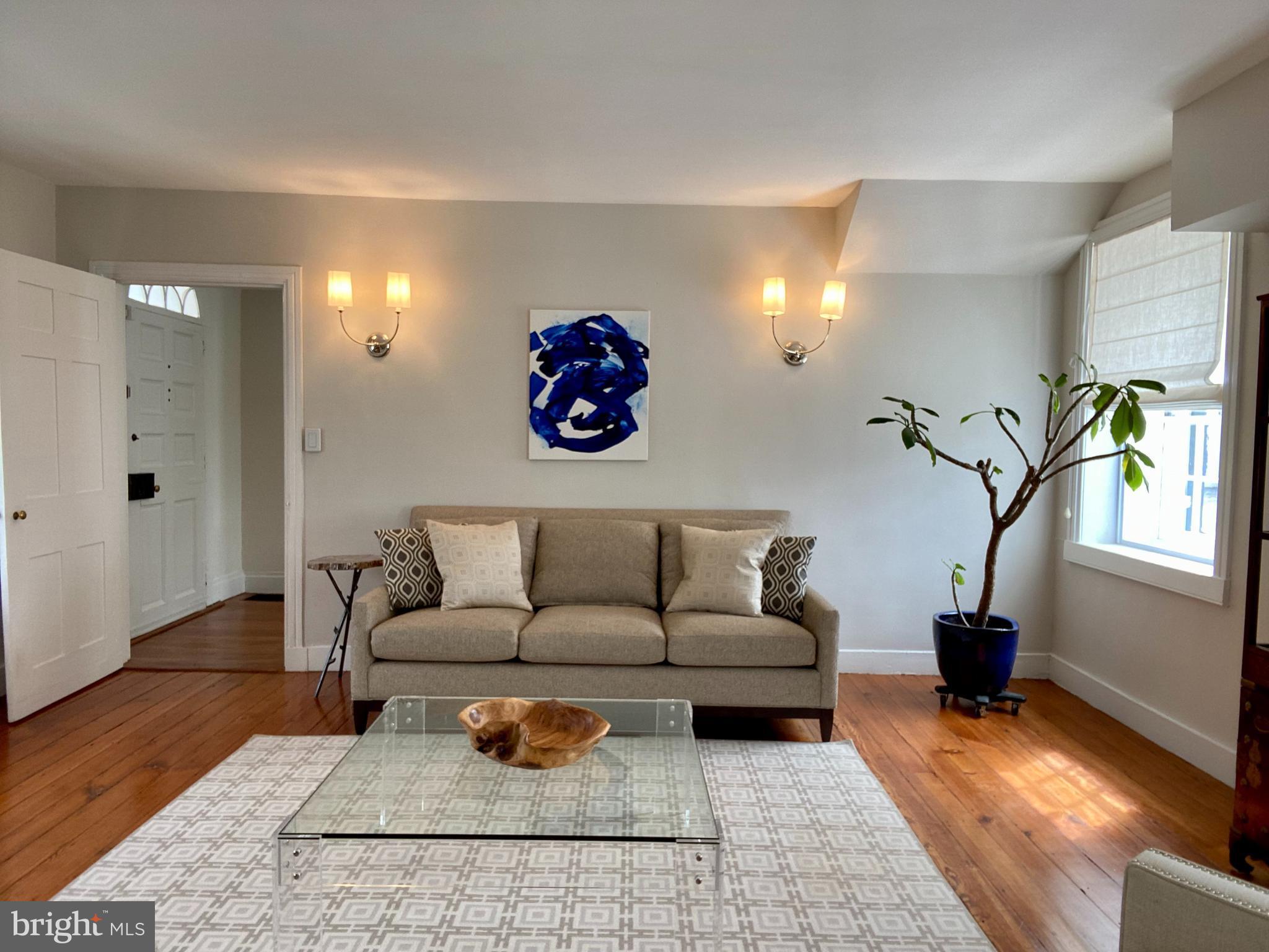 121 Upnor Road Baltimore, MD 21212 - Photo 41 of 79 a living room with furniture and wooden floor