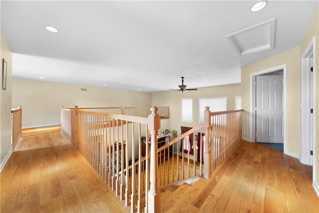 292 Myoma Road Mars, PA 16046 - Photo 16 of 50 a view of a hallway with wooden floor windows