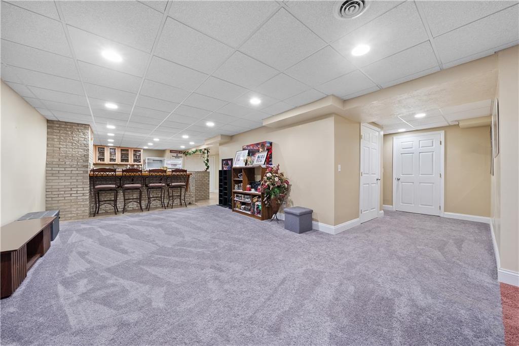 292 Myoma Road Mars, PA 16046 - Photo 42 of 50 a big room with furniture and a large window