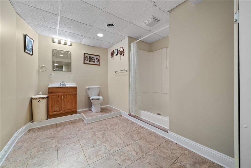 292 Myoma Road Mars, PA 16046 - Photo 45 of 50 a spacious bathroom with a toilet sink and shower