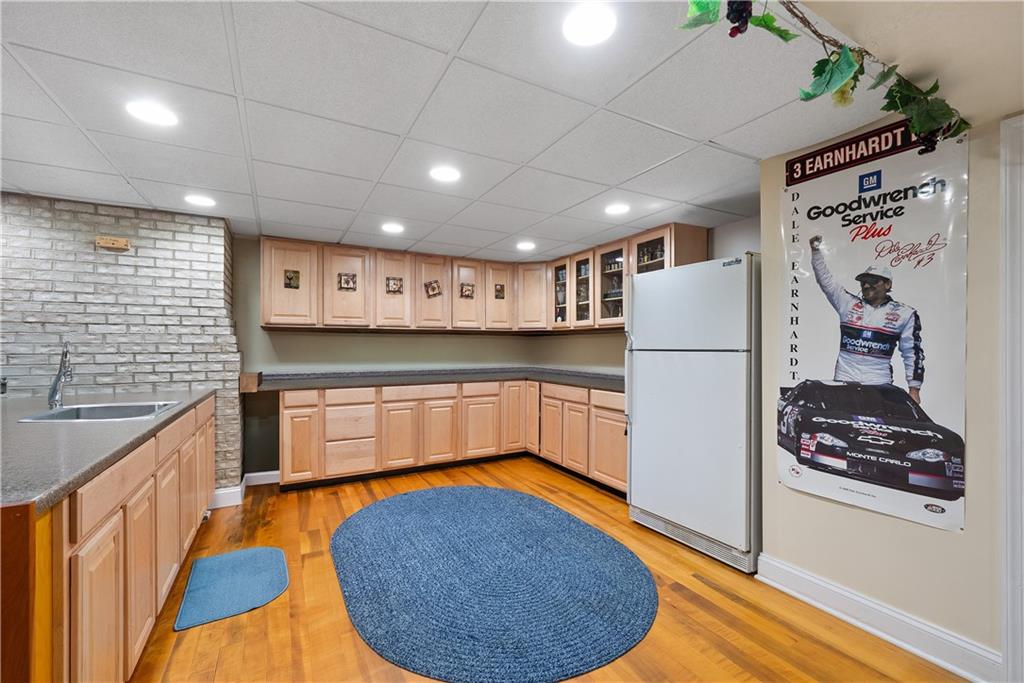 292 Myoma Road Mars, PA 16046 - Photo 46 of 50 a kitchen with stainless steel appliances granite countertop a refrigerator a stove and a sink