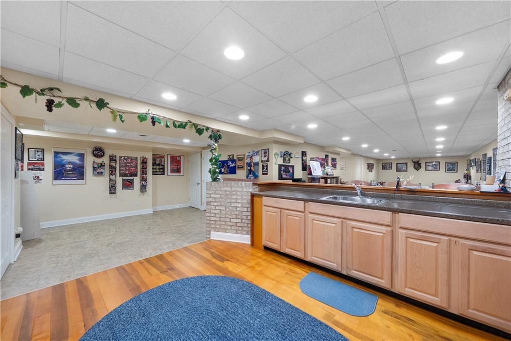 292 Myoma Road Mars, PA 16046 - Photo 48 of 50 a large kitchen with stainless steel appliances granite countertop a sink and cabinets