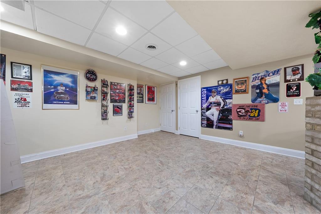 292 Myoma Road Mars, PA 16046 - Photo 49 of 50 an empty room with wall painting and a window