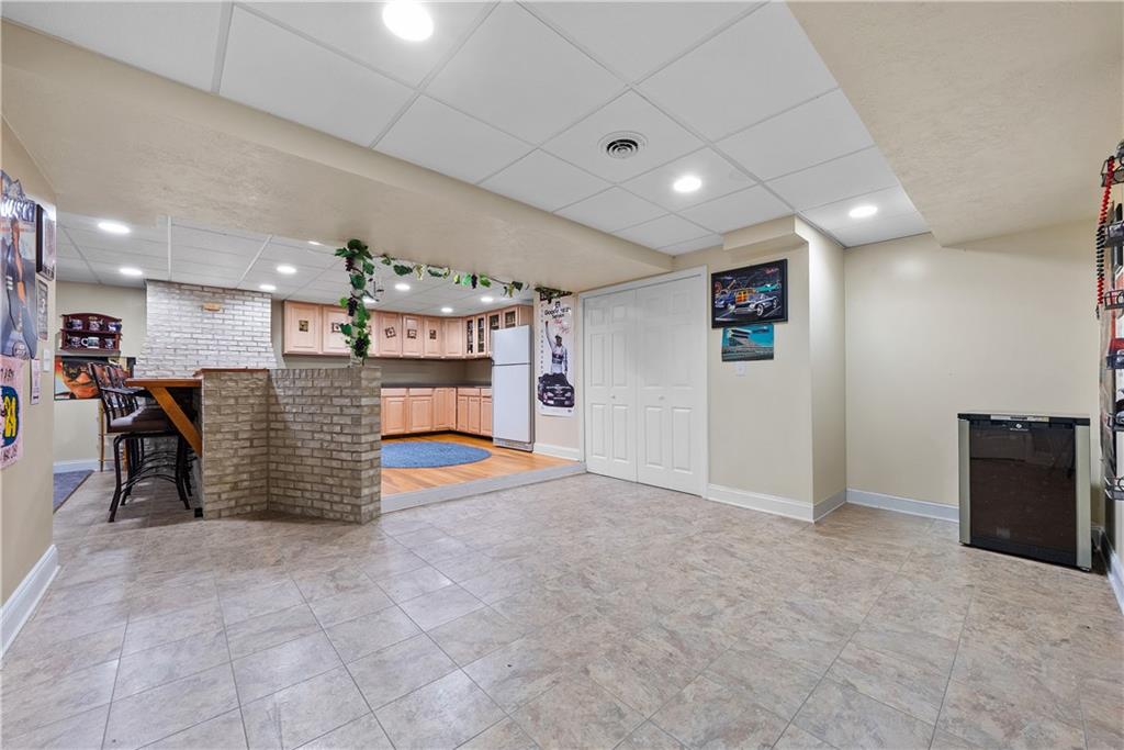 292 Myoma Road Mars, PA 16046 - Photo 50 of 50 an empty room with furniture and a flat screen tv