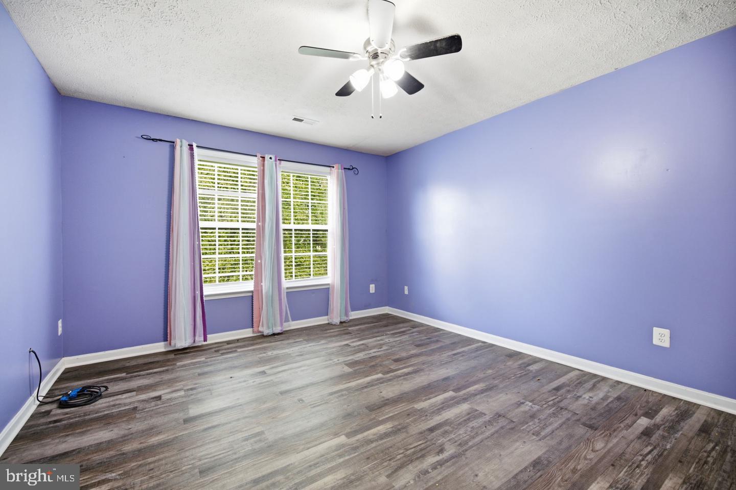 35338 Pheasant Ridge Road Locust Grove, VA 22508 - Photo 36 of 39 Vibrant purple room with natural light.
