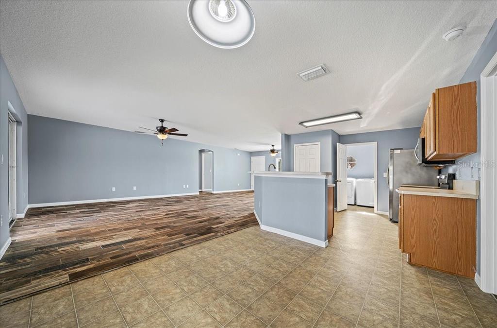 155 Juniper Way Ocala, FL 34480 - Photo 14 of 67 a view of a kitchen with a sink cabinets and a window