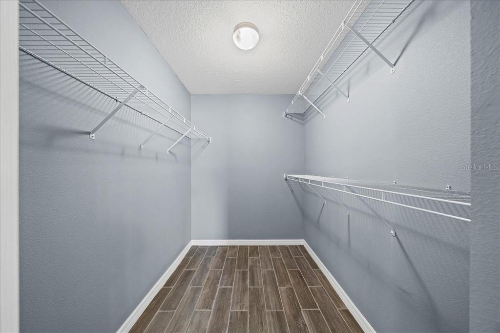 155 Juniper Way Ocala, FL 34480 - Photo 18 of 67 a view of a room with racks on the wall