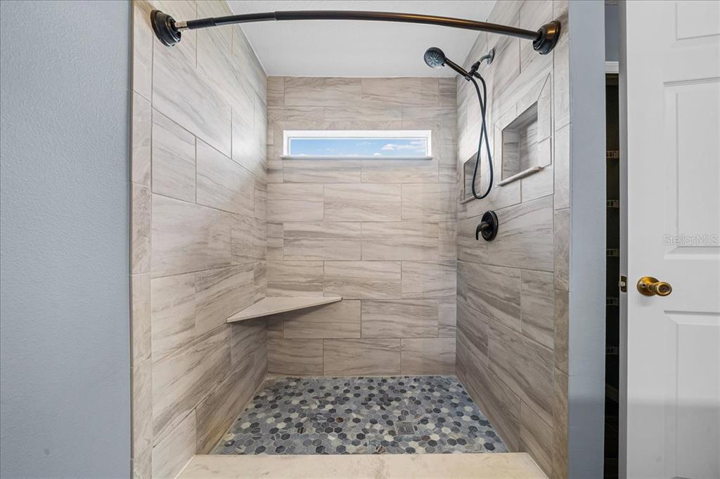 155 Juniper Way Ocala, FL 34480 - Photo 22 of 67 a bathroom with a shower