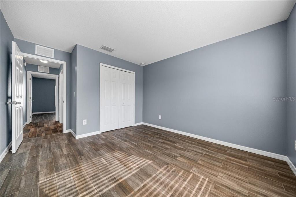 155 Juniper Way Ocala, FL 34480 - Photo 29 of 67 a view of a room with wooden floor and a bathroom