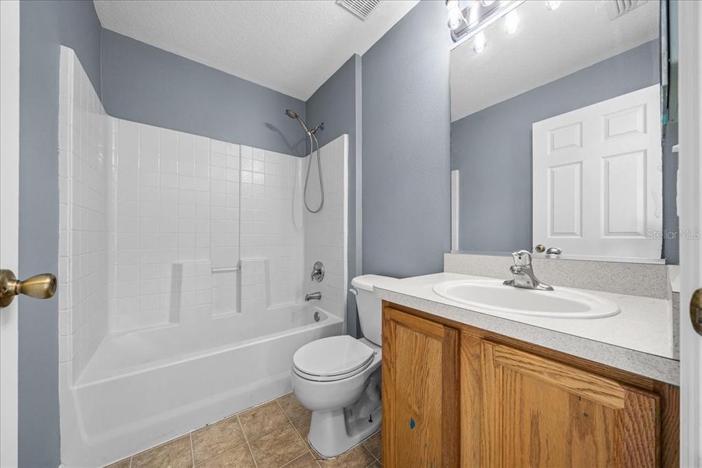 155 Juniper Way Ocala, FL 34480 - Photo 32 of 67 a bathroom with a sink a toilet and a bathtub