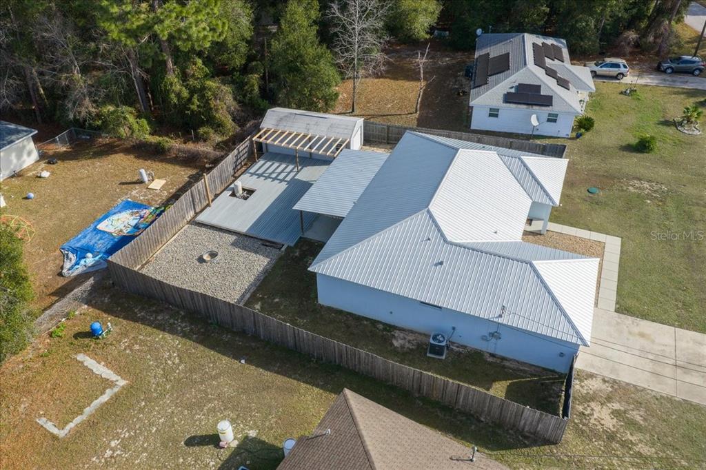 155 Juniper Way Ocala, FL 34480 - Photo 52 of 67 an aerial view of a house with a swimming pool