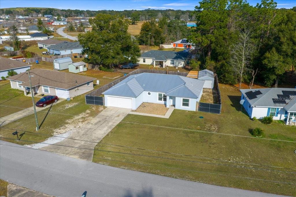 155 Juniper Way Ocala, FL 34480 - Photo 62 of 67 an aerial view of residential houses with outdoor space