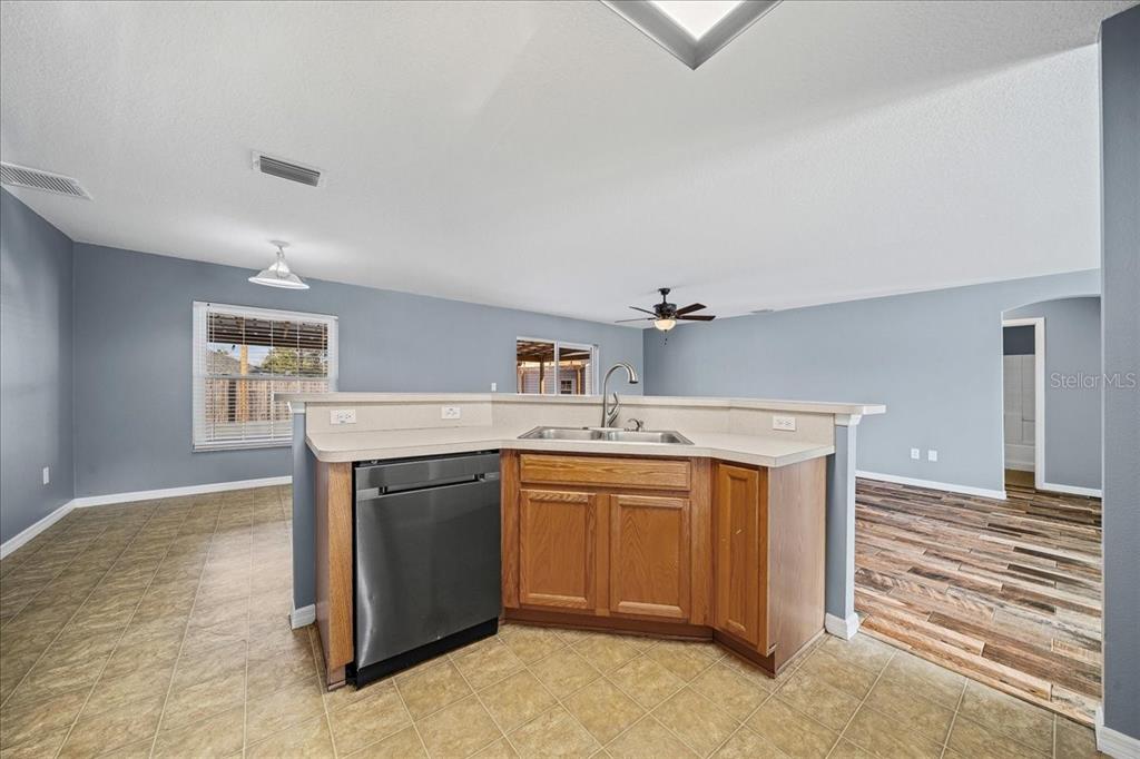 155 Juniper Way Ocala, FL 34480 - Photo 9 of 67 a kitchen with a stove and a sink