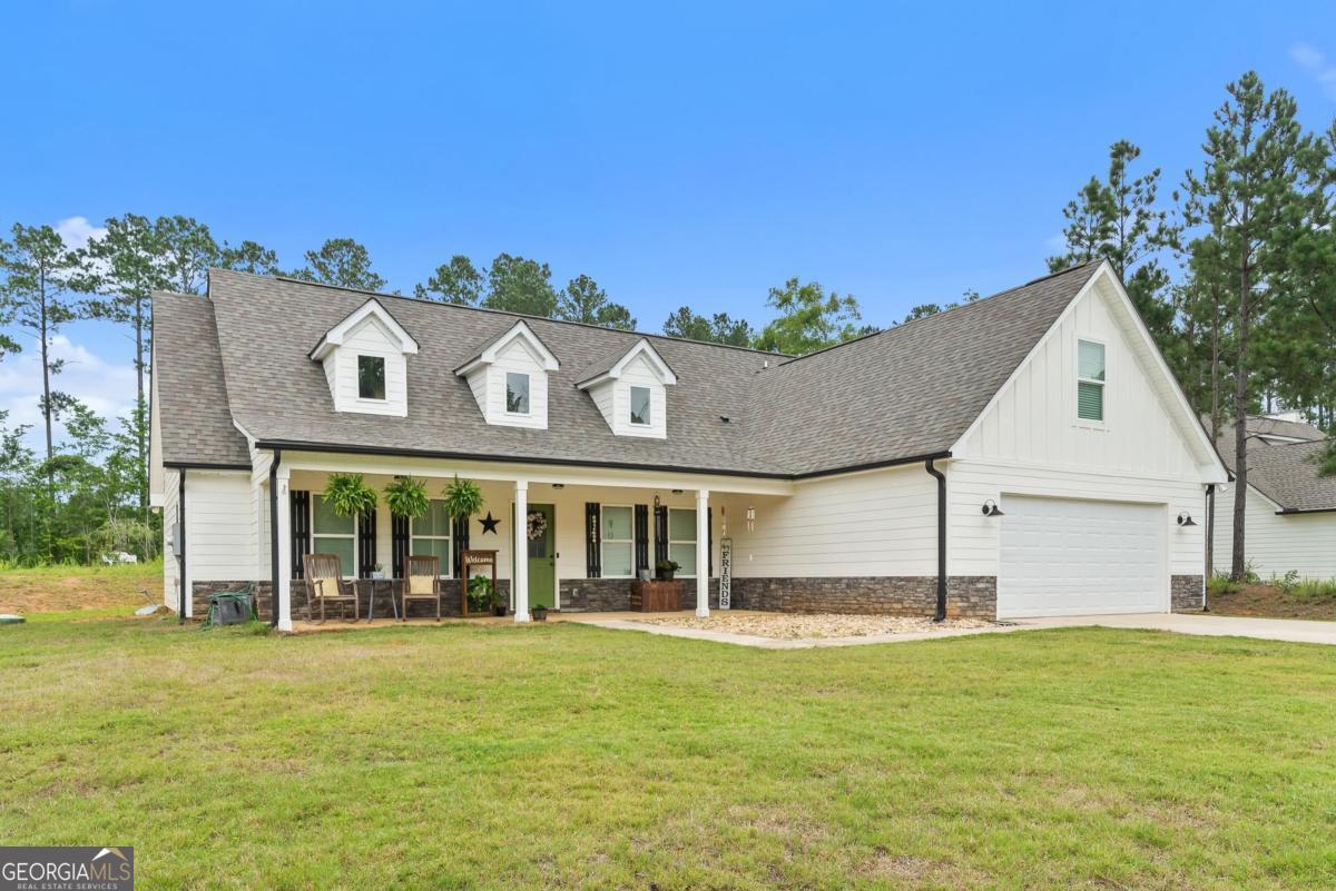 144 Willow Forest Road Milledgeville, GA 31061 - Photo 1 of 1 a view of a house with a swimming pool