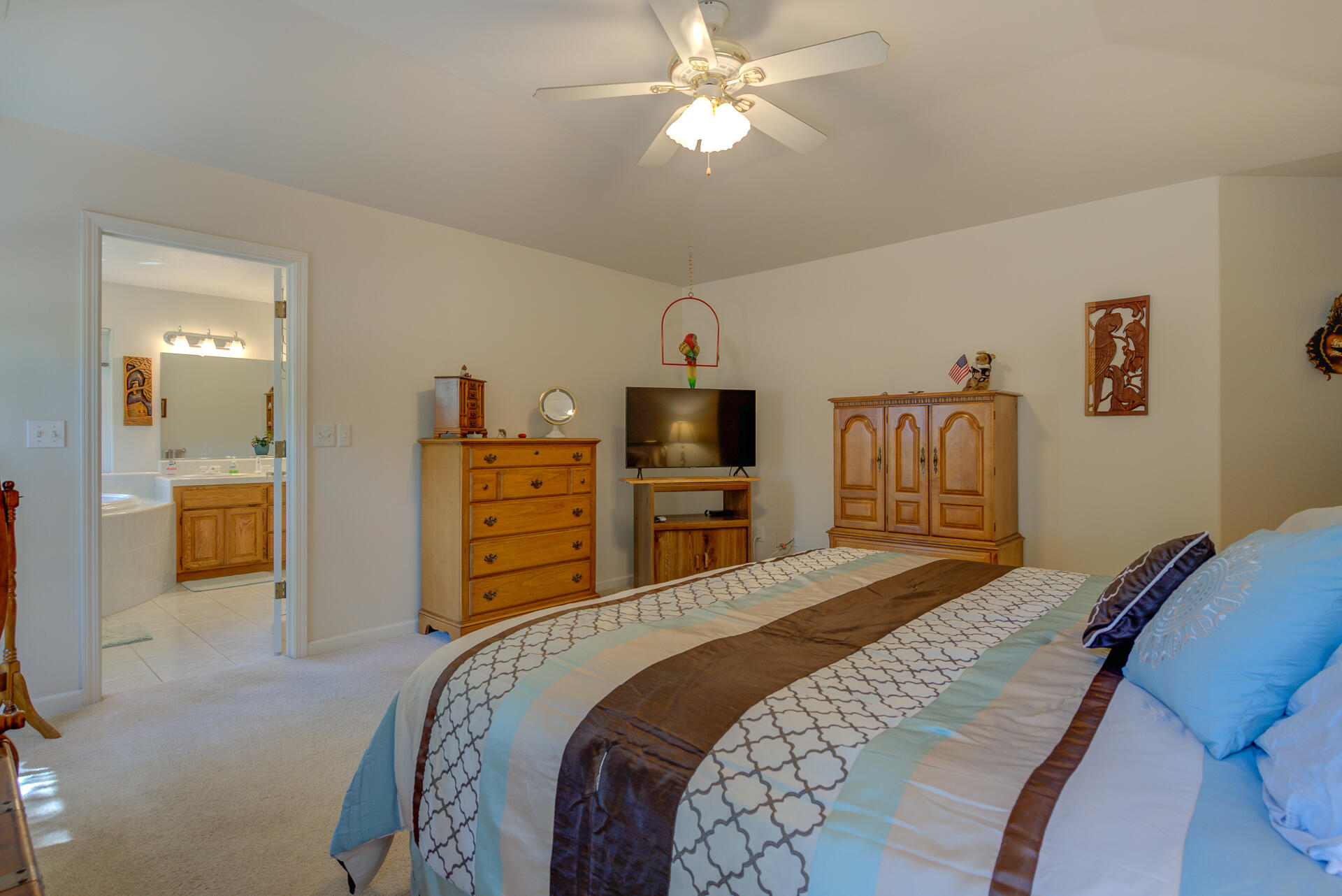 13223 Padani Drive Redding, CA 96003 - Photo 17 of 48 a bedroom with a bed and wooden floor