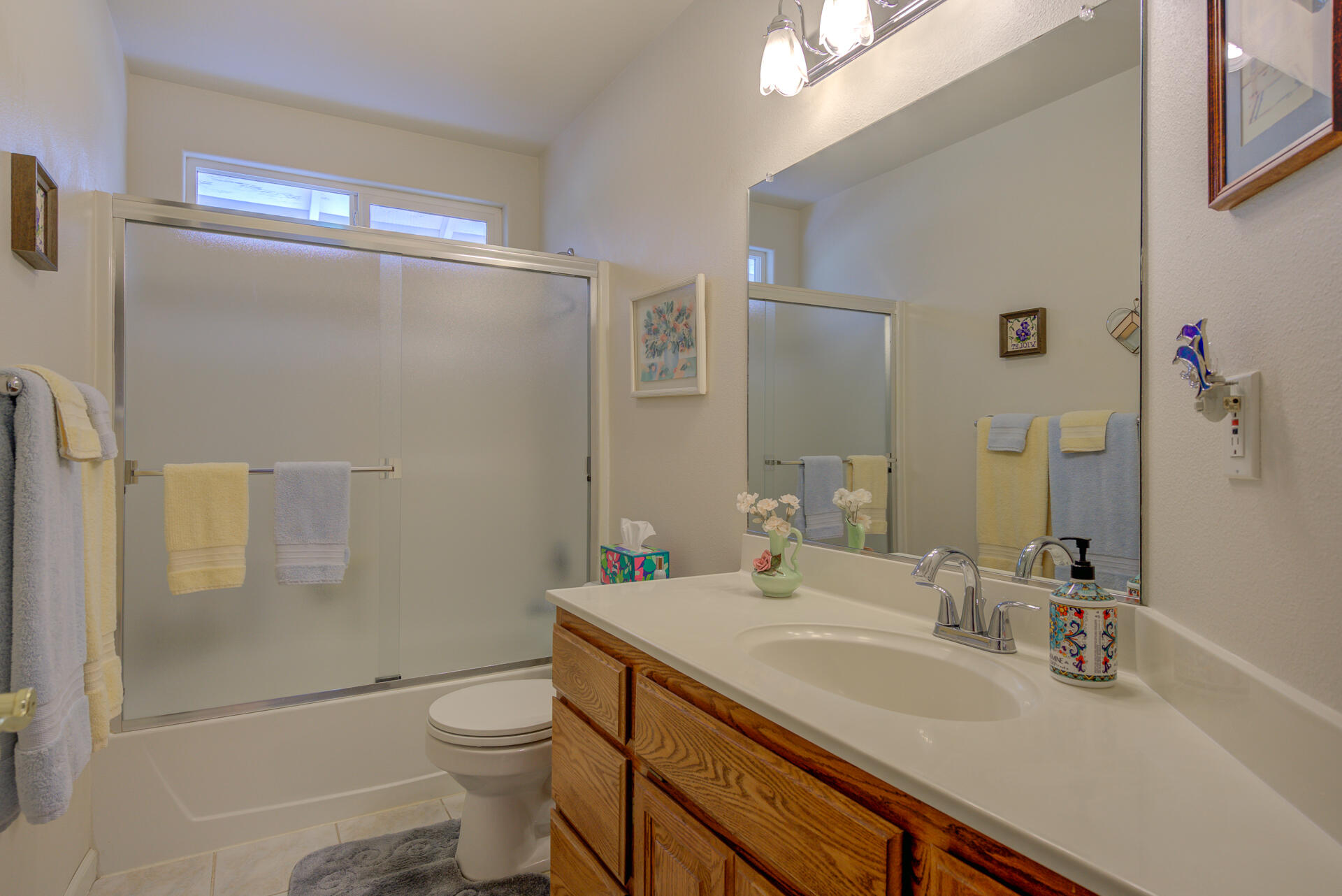 13223 Padani Drive Redding, CA 96003 - Photo 22 of 48 a bathroom with a sink toilet and shower