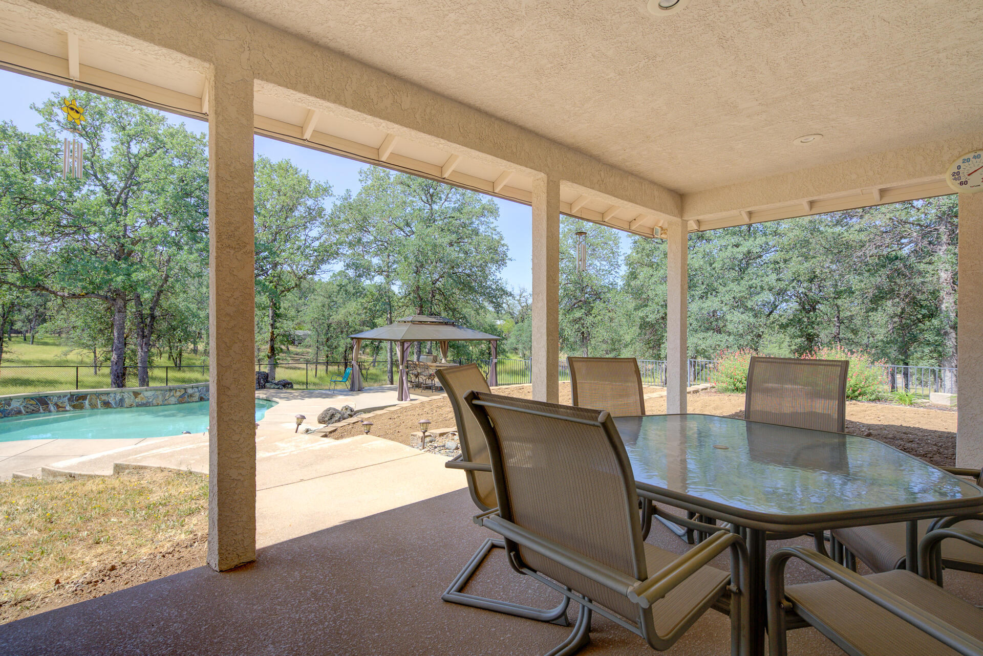13223 Padani Drive Redding, CA 96003 - Photo 27 of 48 a view of a room with a table and chairs