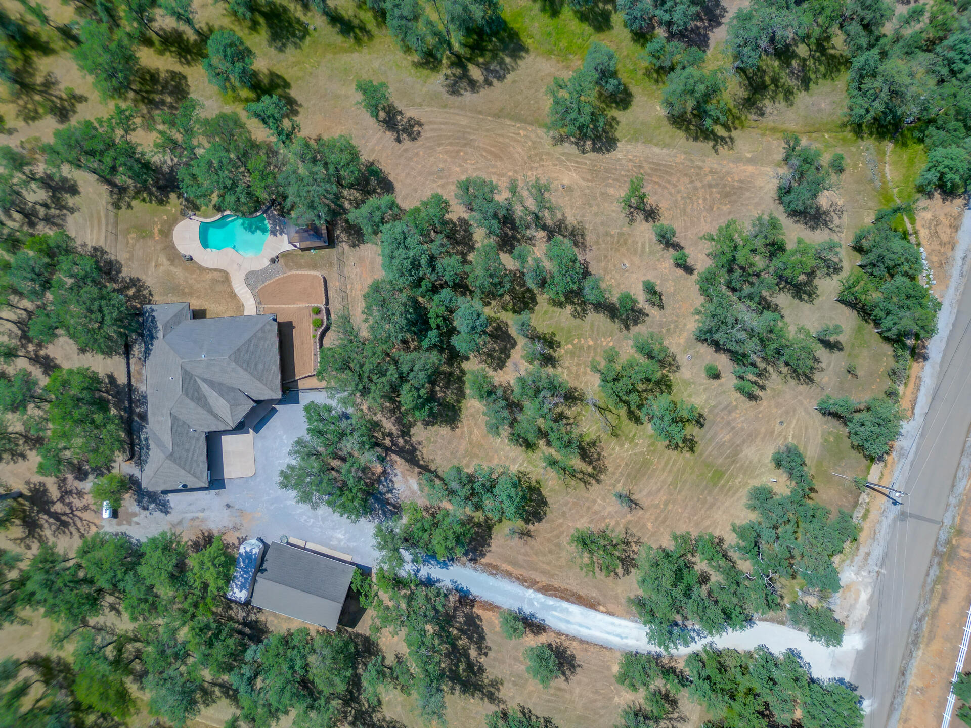 13223 Padani Drive Redding, CA 96003 - Photo 41 of 48 an aerial view of a house with a yard