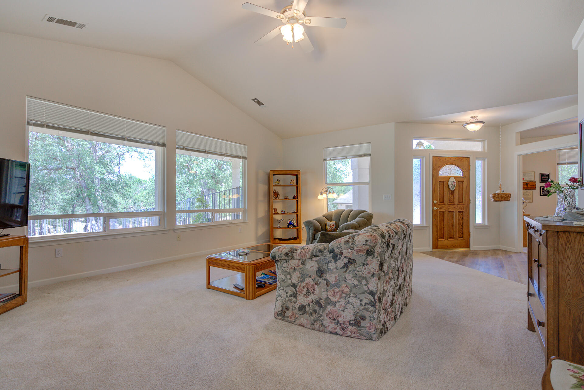 13223 Padani Drive Redding, CA 96003 - Photo 5 of 48 a living room with furniture and a large window
