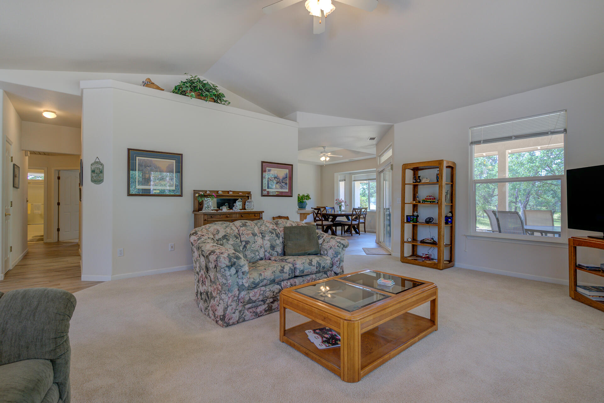 13223 Padani Drive Redding, CA 96003 - Photo 6 of 48 a living room with furniture and a flat screen tv