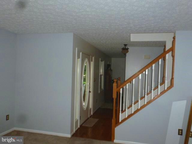 433 Pine Road Stephenson, VA 22656 - Photo 3 of 24 Foyer, guest coat closet, stairs to upper level