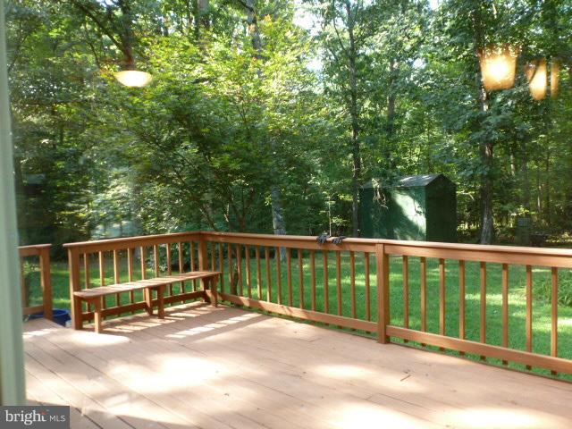 433 Pine Road Stephenson, VA 22656 - Photo 8 of 24 Large rear deck backs to woods,~storage shed