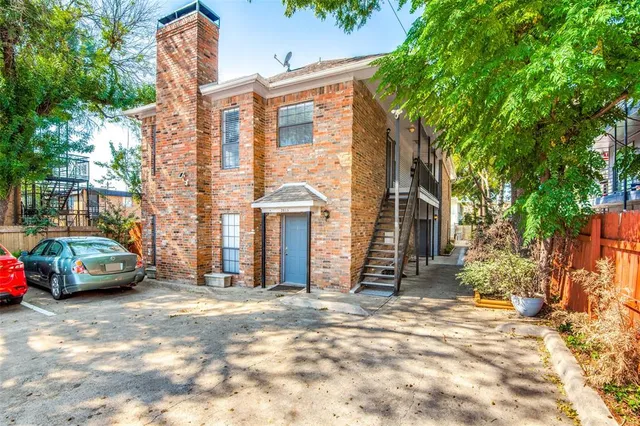 a view of a car park in front of a building