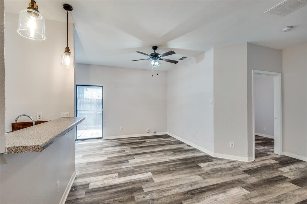 2815 Reagan Street Dallas, TX 75219 - Photo 12 of 40 a very nice looking room with a ceiling fan