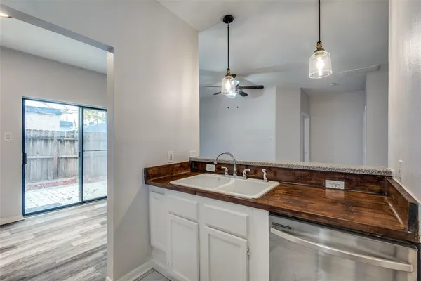 a bathroom with a sink a vanity and mirror