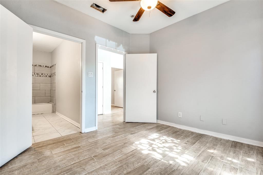 2815 Reagan Street Dallas, TX 75219 - Photo 27 of 40 wooden floor in an empty room