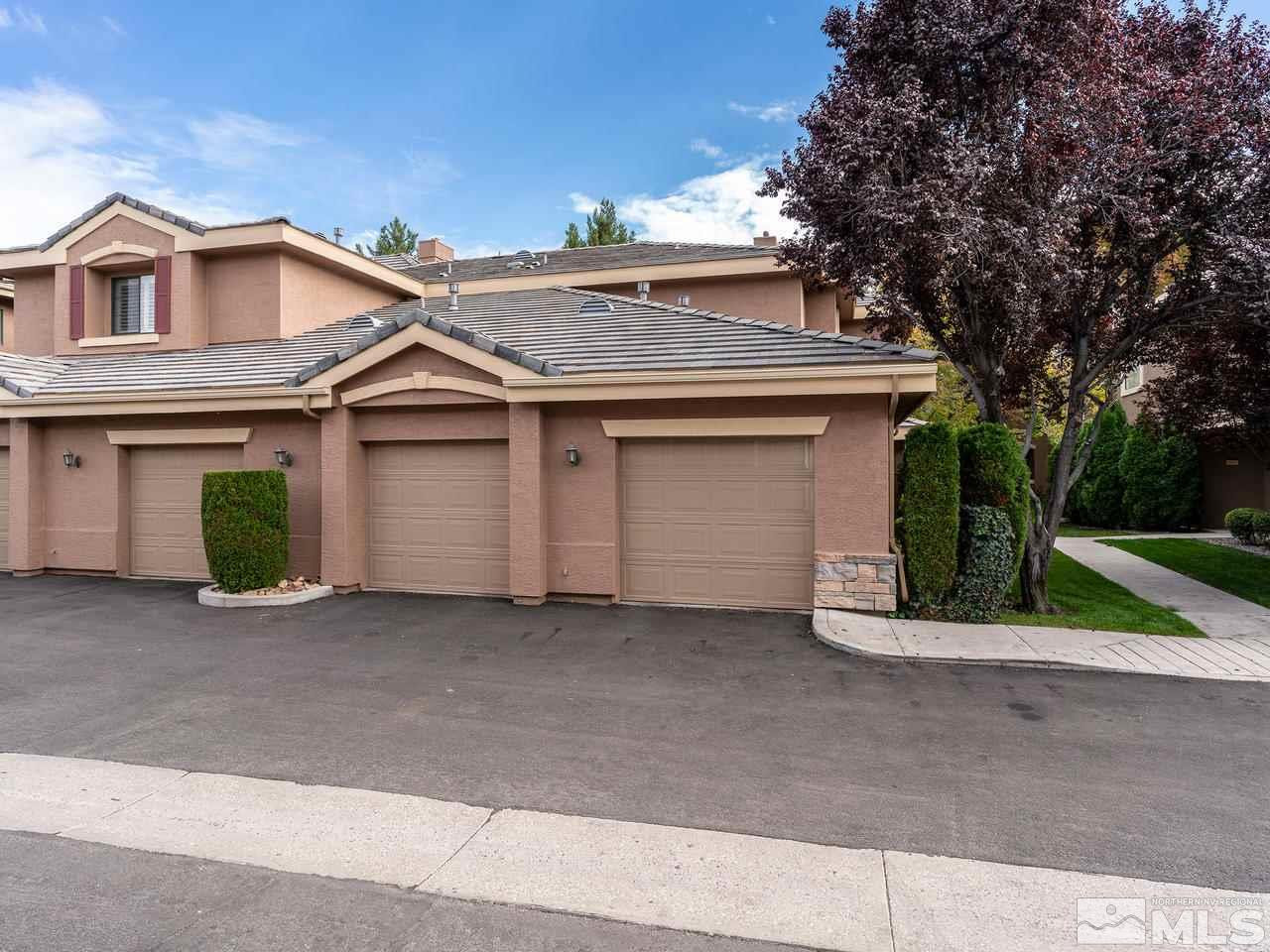 900 South, Unit 214 Reno, NV 89521 - Photo 1 of 22 a front view of a house with a garage