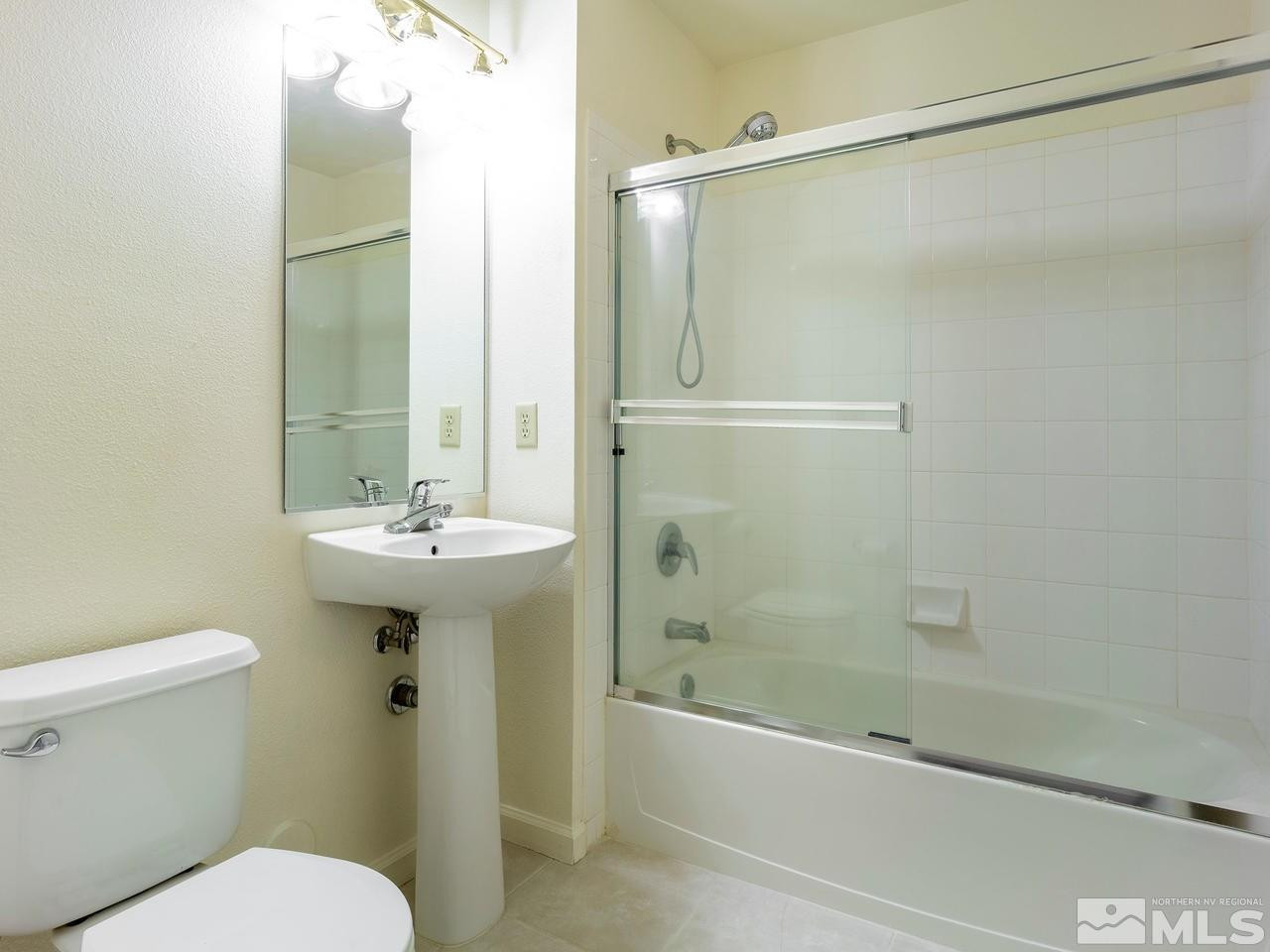 900 South, Unit 214 Reno, NV 89521 - Photo 12 of 22 a bathroom with a sink toilet and shower