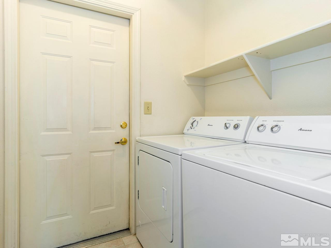 900 South, Unit 214 Reno, NV 89521 - Photo 13 of 22 a utility room with dryer and washer