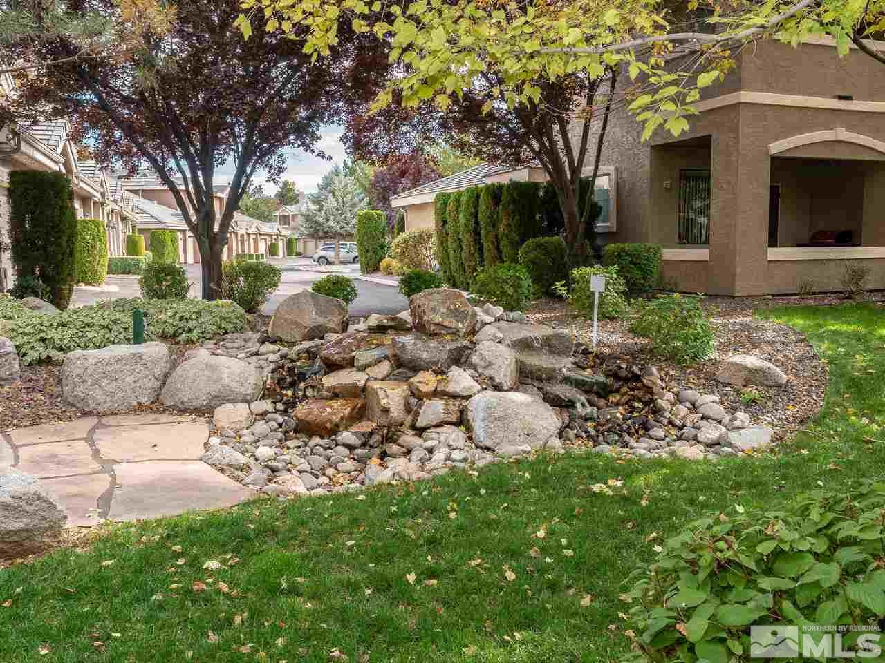 900 South, Unit 214 Reno, NV 89521 - Photo 15 of 22 a view of a house with a yard and tree s