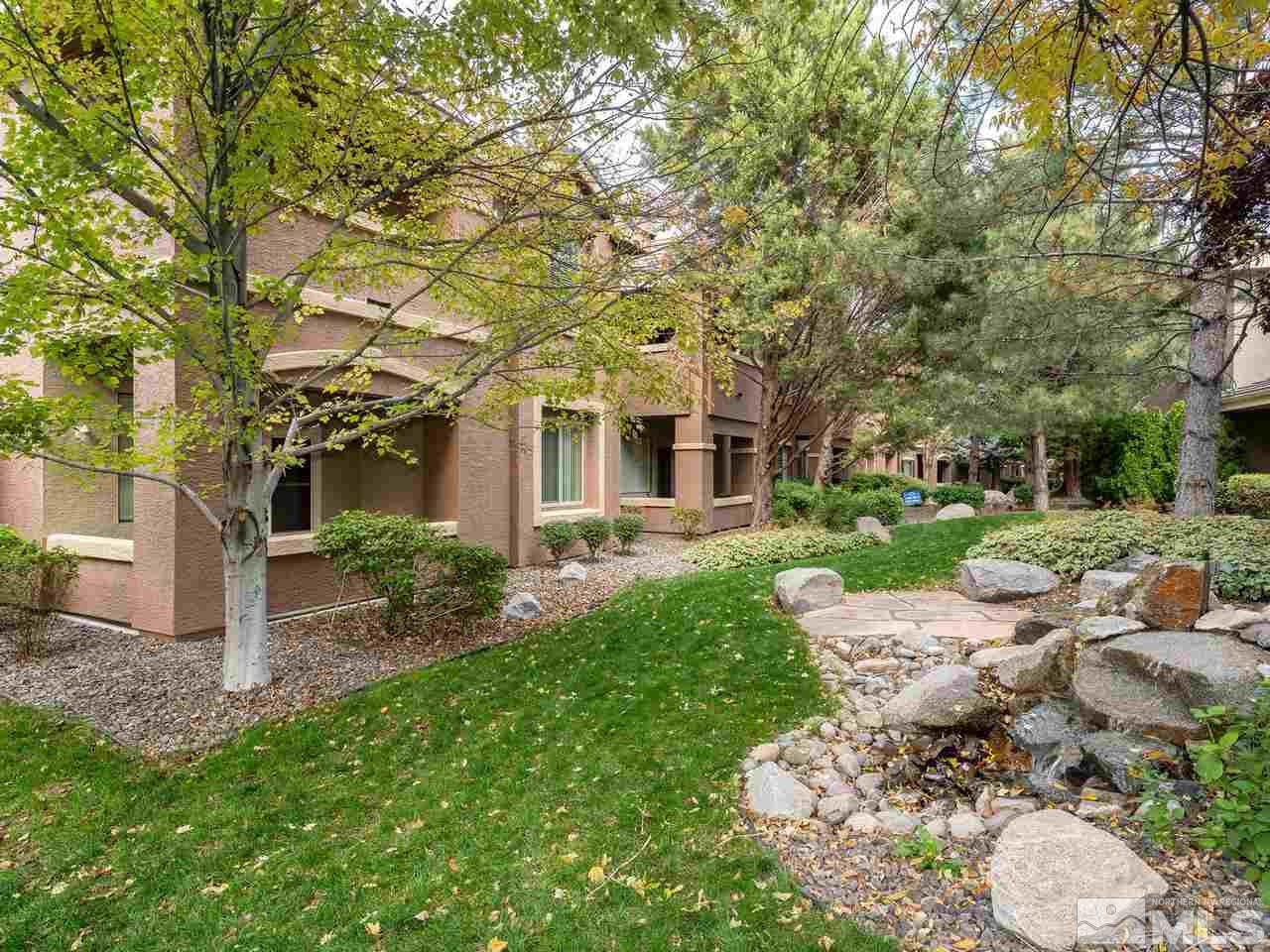 900 South, Unit 214 Reno, NV 89521 - Photo 16 of 22 a front view of a house with garden