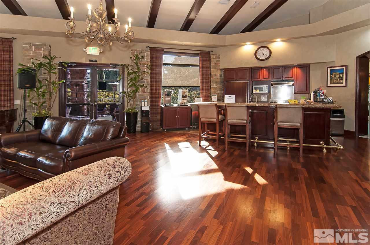 900 South, Unit 214 Reno, NV 89521 - Photo 19 of 22 a living room with furniture and wooden floors