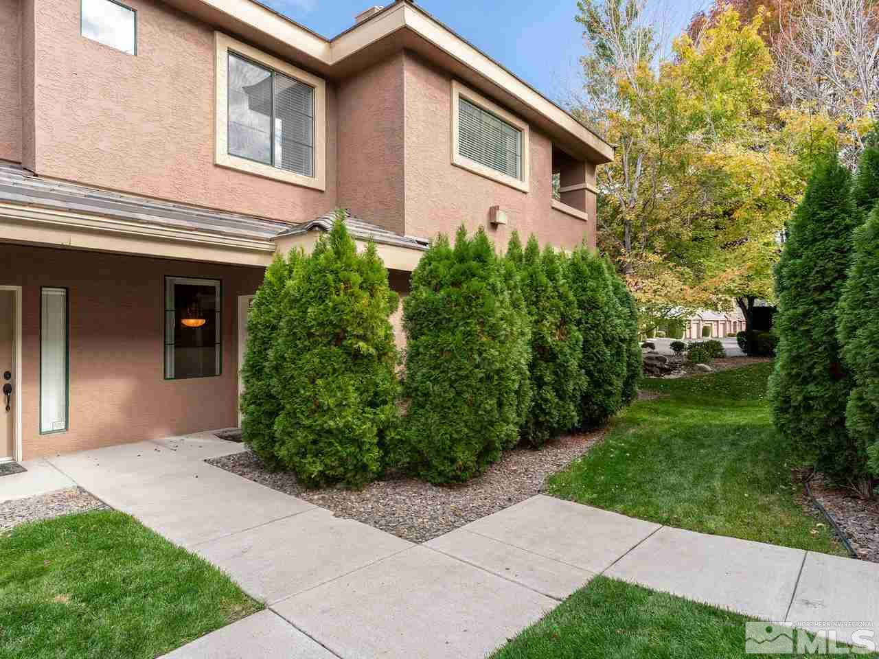 900 South, Unit 214 Reno, NV 89521 - Photo 2 of 22 a front view of a house with a yard