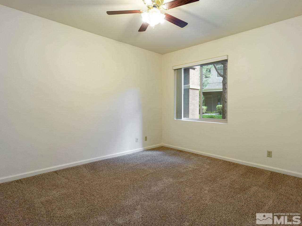 900 South, Unit 214 Reno, NV 89521 - Photo 9 of 22 a view of an empty room with a window