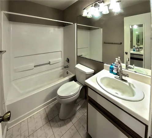 a room with pool table and a chandelier