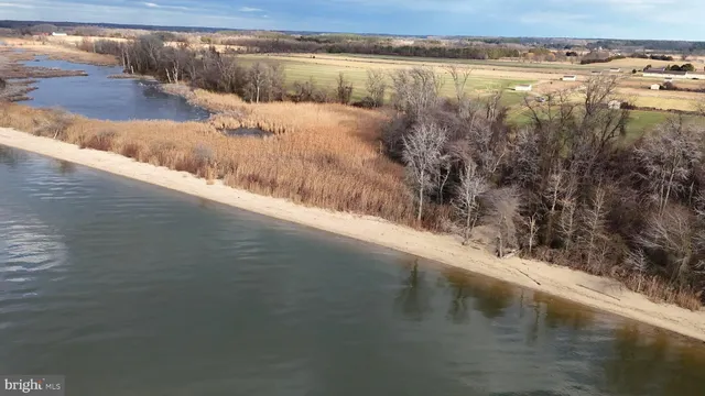 a view of a lake with a yard