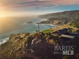 a view of a lake with mountain
