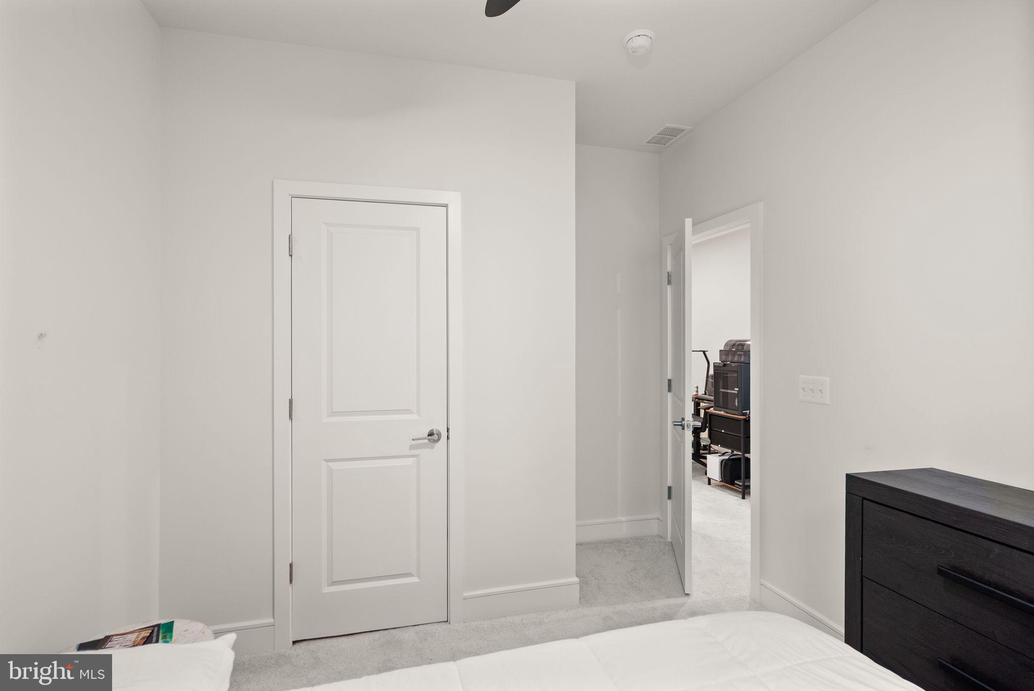 23062 Copper Tree Terrace Ashburn, VA 20148 - Photo 30 of 38 a bathroom with a sink and a shower