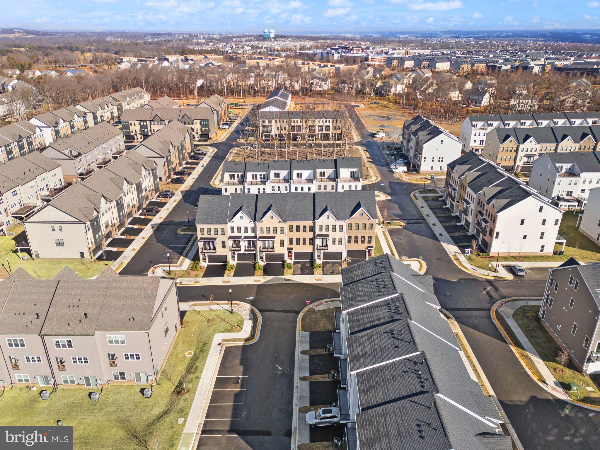 23062 Copper Tree Terrace Ashburn, VA 20148 - Photo 37 of 38 an aerial view of a residential apartment building with a city view