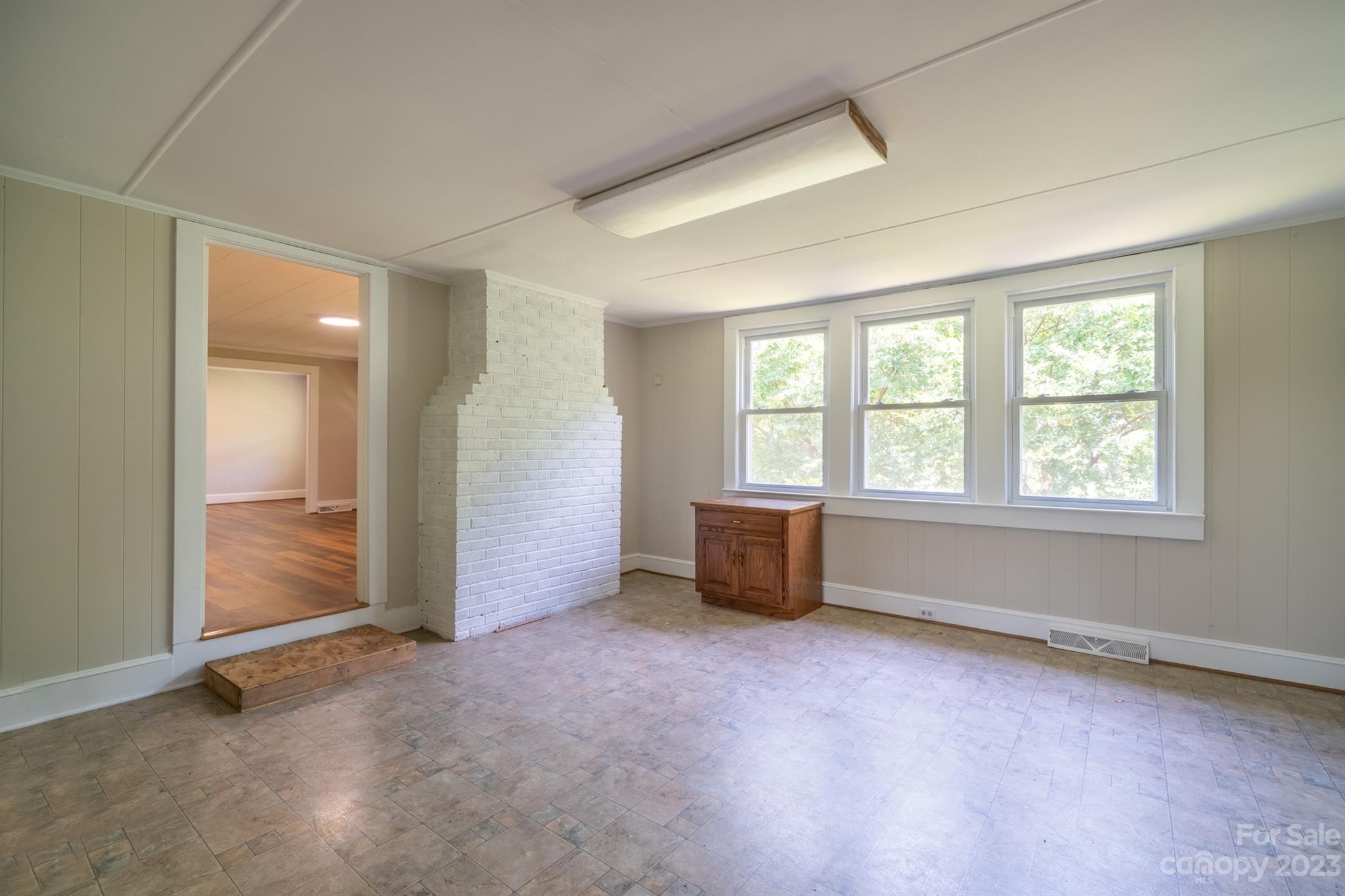 17158 Pond Road Locust, NC 28097 - Photo 13 of 28 an empty room with windows and bathroom
