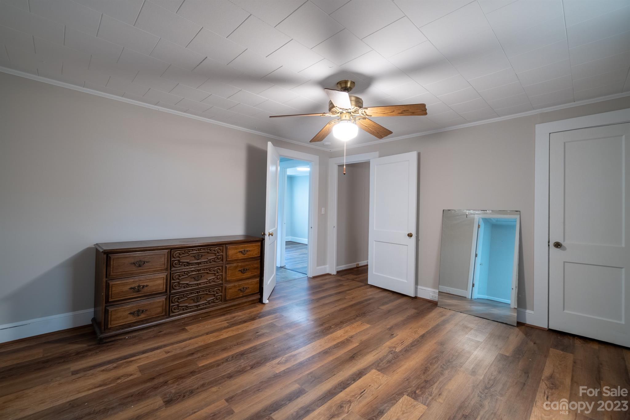 17158 Pond Road Locust, NC 28097 - Photo 14 of 28 wooden floor in an empty room with a window